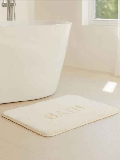 Sinsay - Kúpeľňový koberec s nápisom BATH - krémová